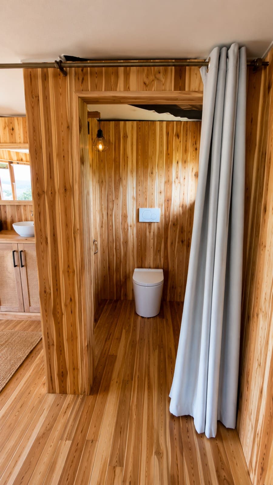 Hardwood ensuite bathroom detail in a luxury tented suite, Rungwa North